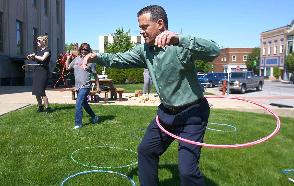man playing with hoola hoop